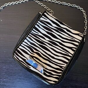 White House Black Market black and white zebra side purse over the shoulder